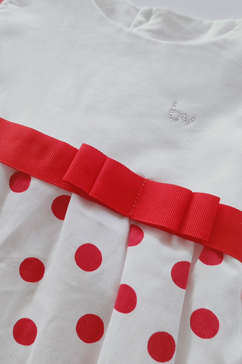 Pagliaccetto mezza manica in cotone fantasia pois con nastro in gros grain e stras