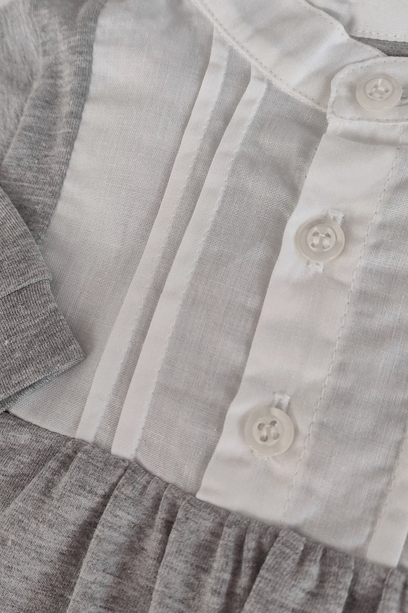 Tutina collo coreano con inserti in tela di cotone con pieghette e bottoncini