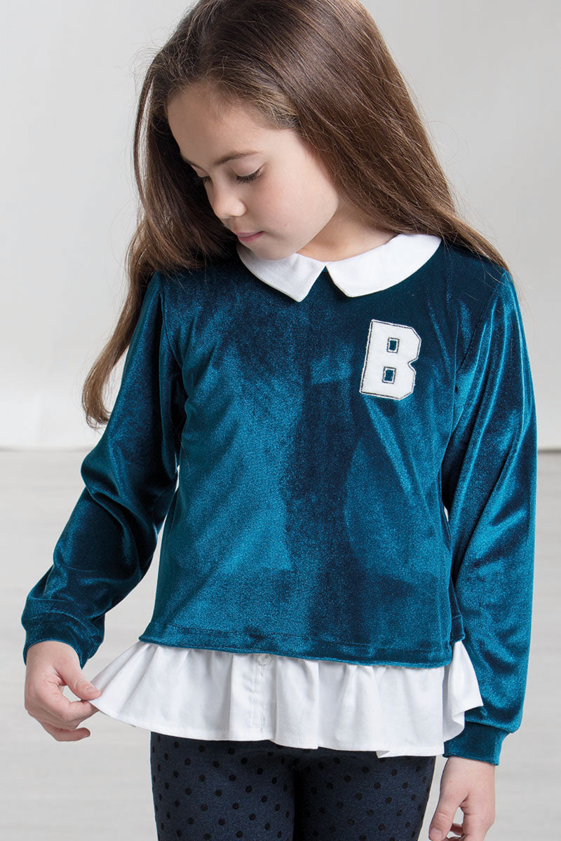 Maglia in velluto con inserti in tela di cotone effetto camicia, ricamo lato cuore con inserto in ecopelliccia