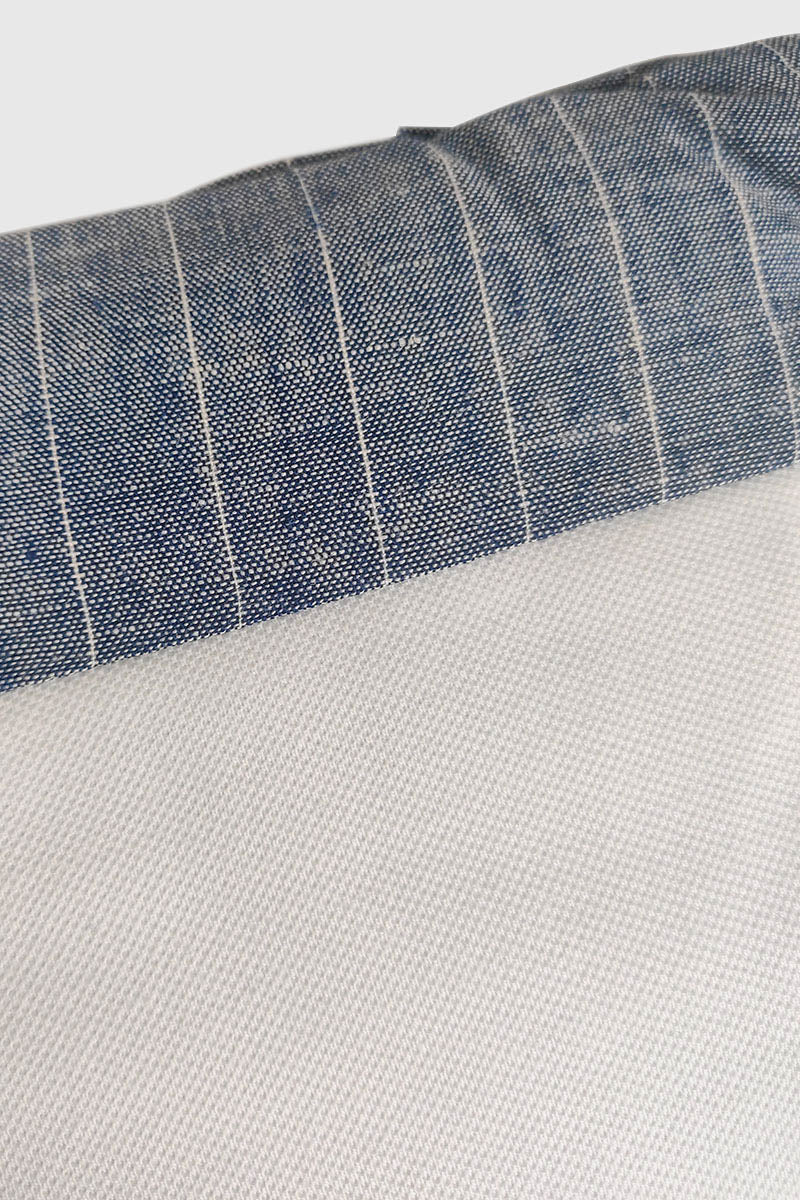 Copertina sfoderabile in piquet con inserto in tessuto rigato ed imbottitura