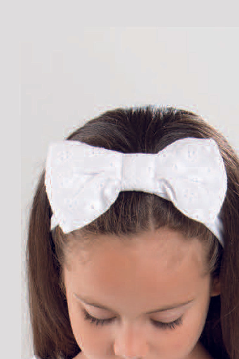 Fascia per capelli in cotone elasticizzato con fiocco in tela sangallo
