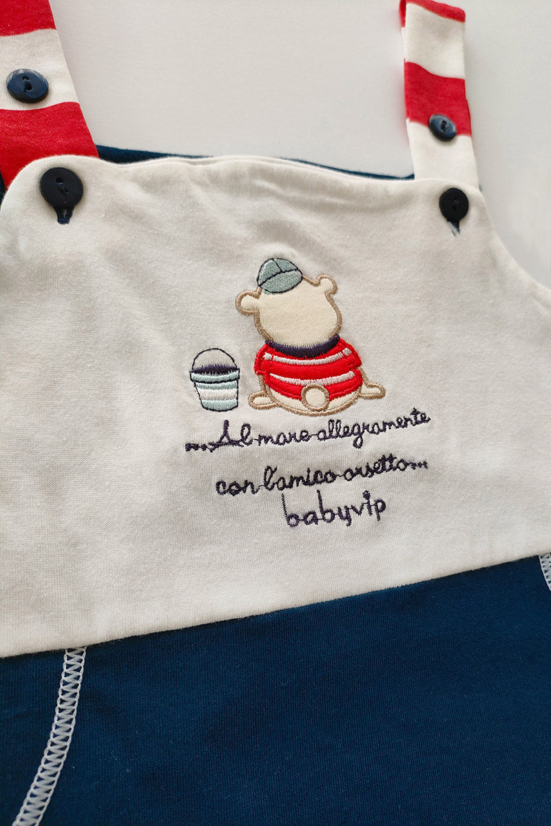 Salopette in cotone con ricamo orsetto