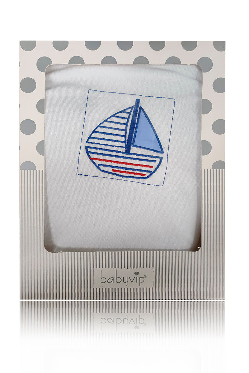 Copertina in piquet con ricamo barchetta