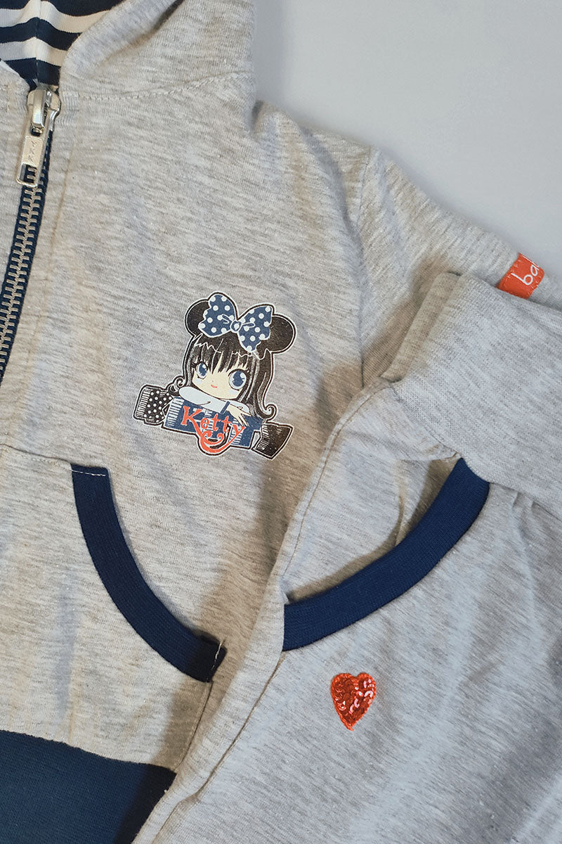 Tuta con cappuccio neonata/bimba in cotone elasticizzato con applicazioni e stampa