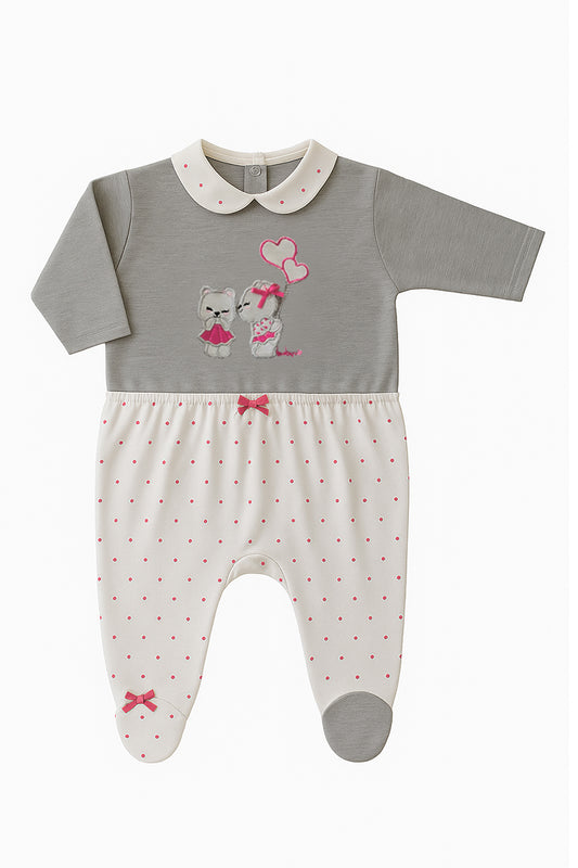 Tutina in cotone con ricamo e fiocchettini