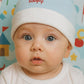 Cappellino in ciniglia con risvolto e ricamo scritta Babyvip