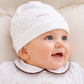 Cappellino in ciniglia a pois con ricamo