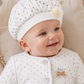 Cappellino in ciniglia a pois con applicazione