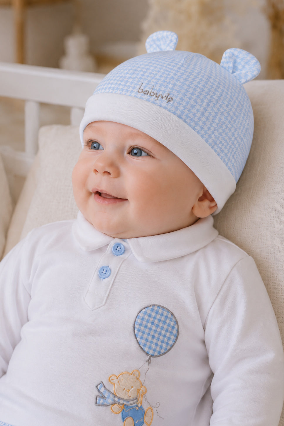 Cappellino in felpa garzata pied de poule con ricamo