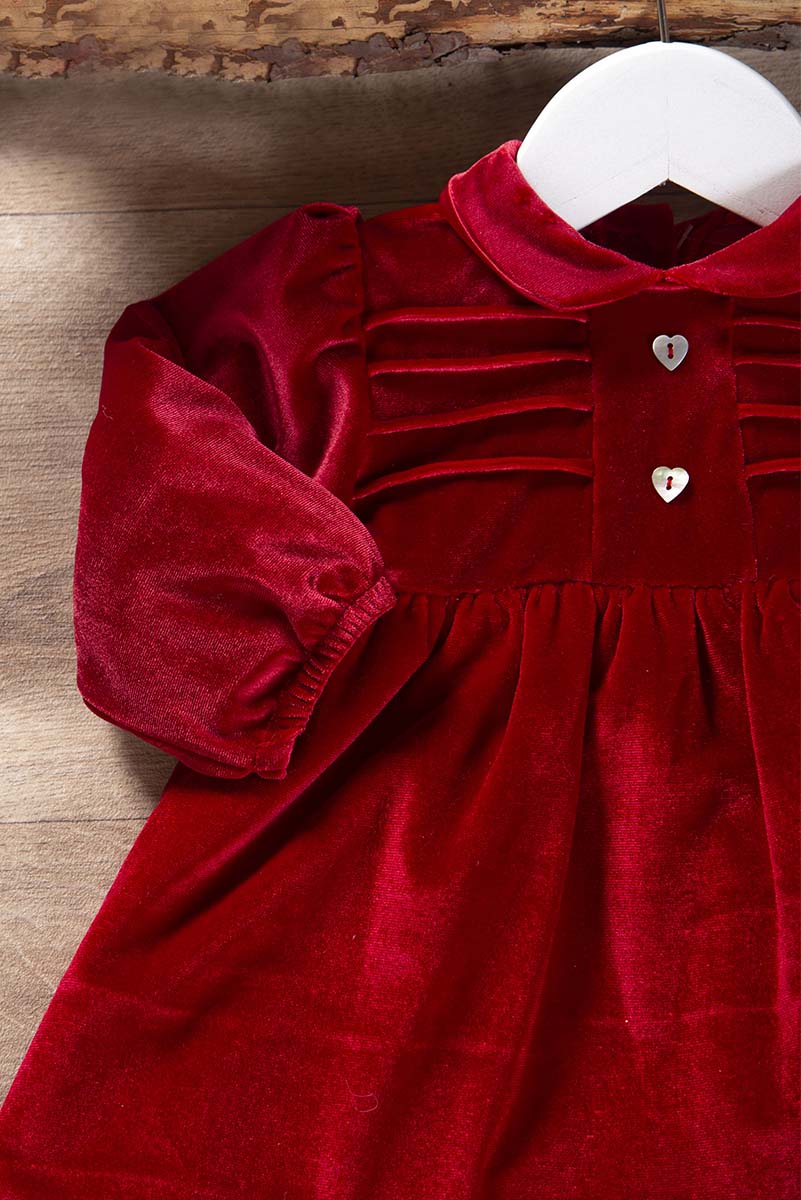 Vestitino in velluto elasticizzato bottoncini in madreperla a forma di cuore taglio con arricciature e maniche a sbuffo