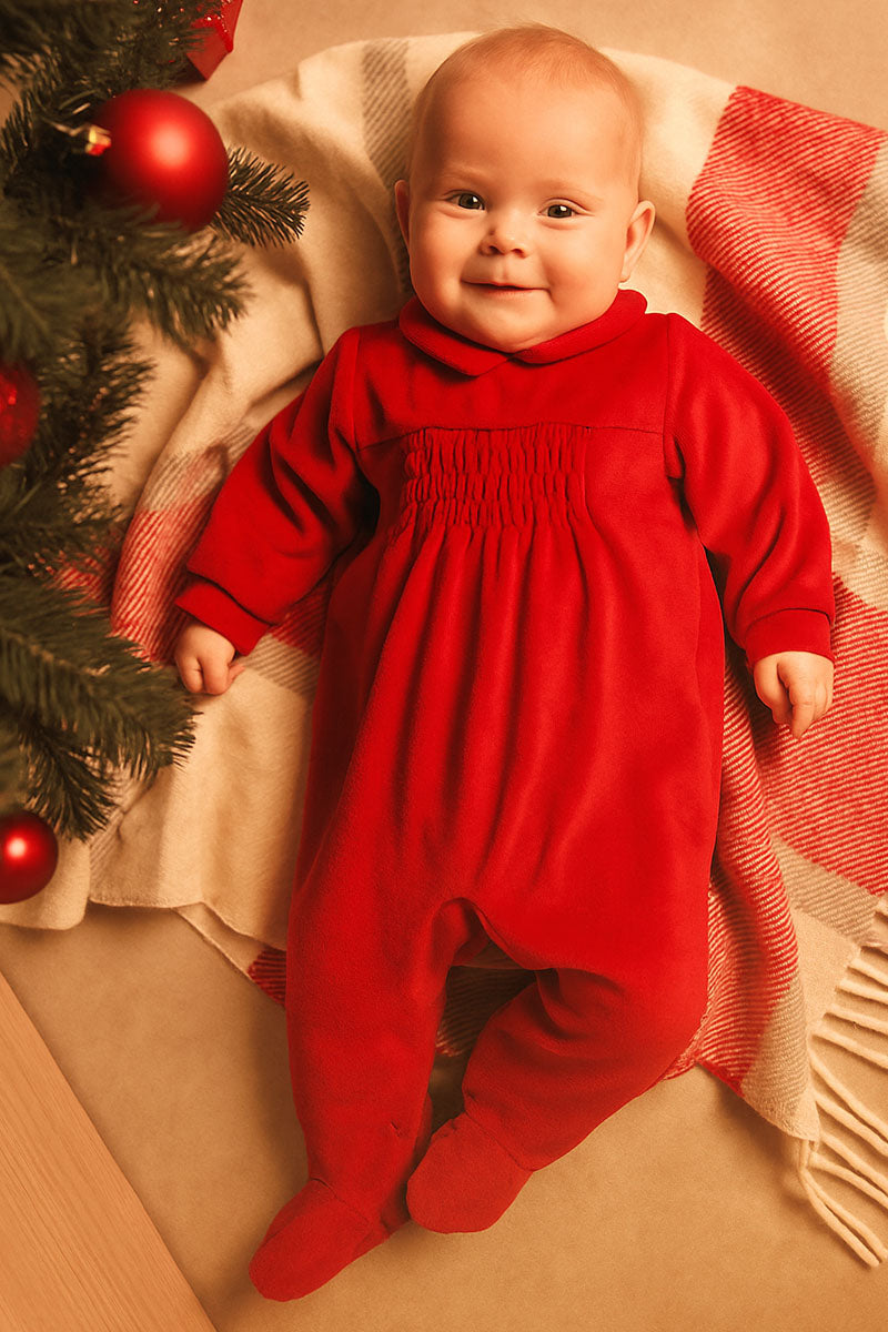 Tutina in ciniglia con punto smock