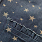 Salopette in tela jeans con fantasia stelle e tasche