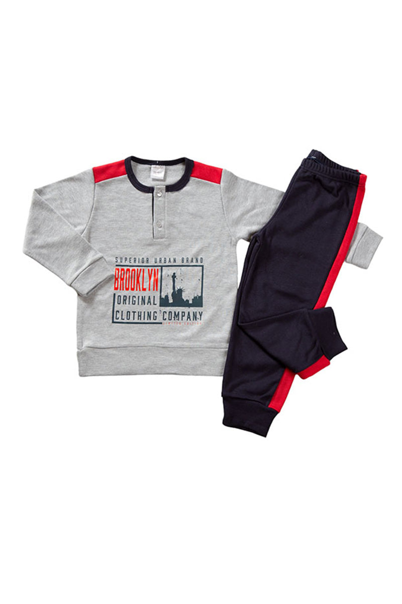 Pigiama in caldo cotone con stampa, fenda, bande su spalla e pantalone in contrasto