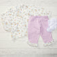 Completo 2 pezzi: Camicia in mussola di cotone fantasia provenzale con colletto, piega, bottoncini in madreperla e maniche a sbuffo + leggings in jersey elasticizzato con rouche al fondo fantasia