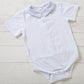 Body a camicia in jersey elasticizzato con colletto in tela di cotone goffrata millerighe con bottoni e pieghette
