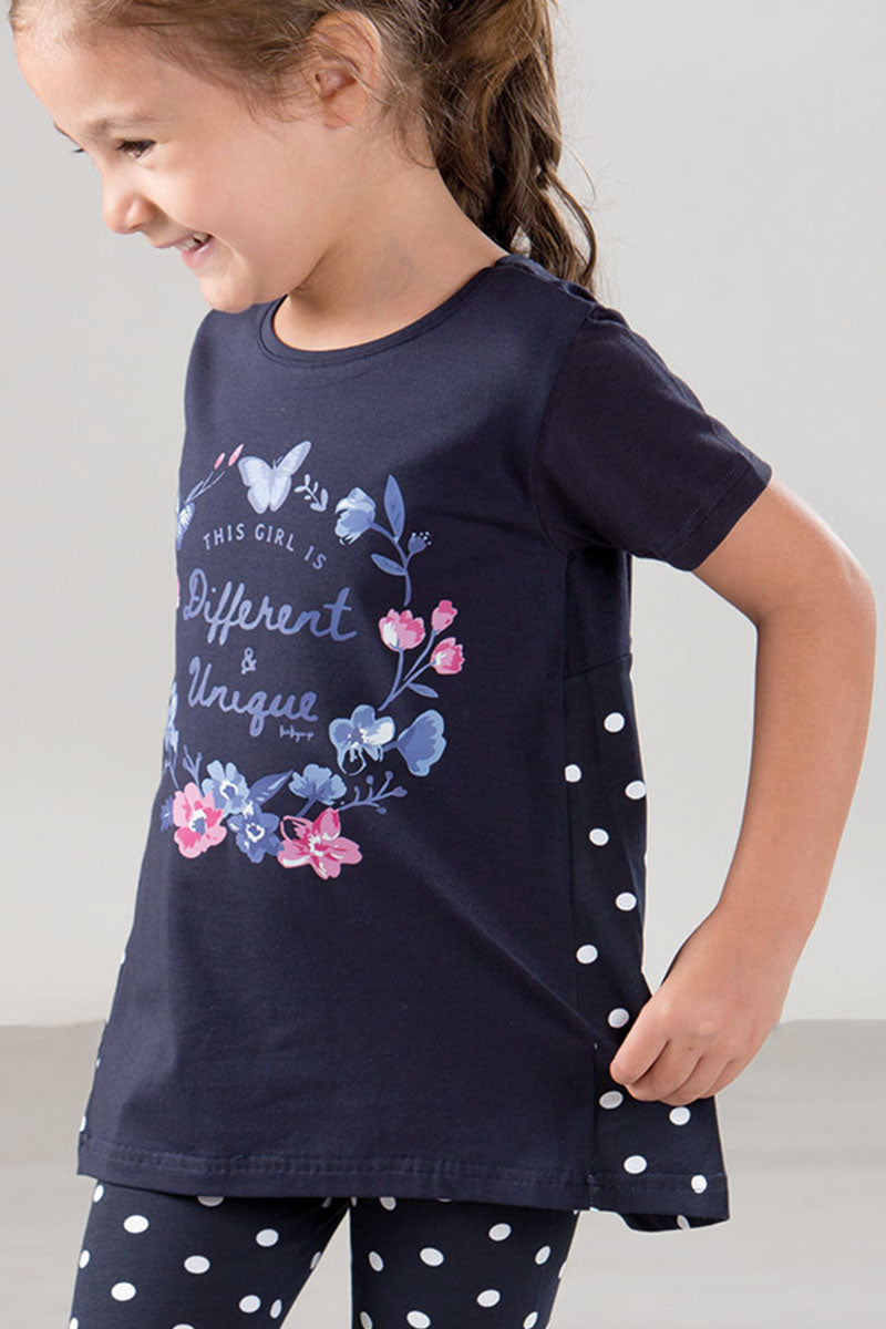 Completo in cotone elasticizzato con stampa ed inserto a pois con pinocchietto a pois