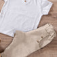 Pantalone modello cavallo basso in lino con tasche e risvolti sul fondo