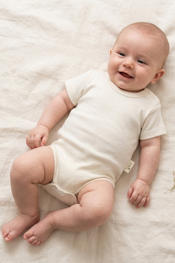Body neonato mezza manica in cotone organico