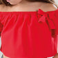 Top in crepe con rouches e fiocco applicato