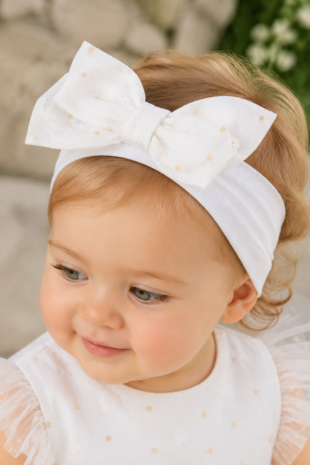 Fascia per capelli  in cotone elasticizzato con fiocco in tulle fantasia pois e glitter