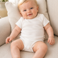 Body neonato mezza manica in cotone organico